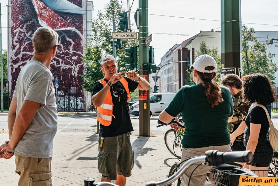 Berlin: Cold War & Berlin Wall History Guided Bike Tour - Pedaling to Brandenburg Gate: Origins, Context, and Contrast