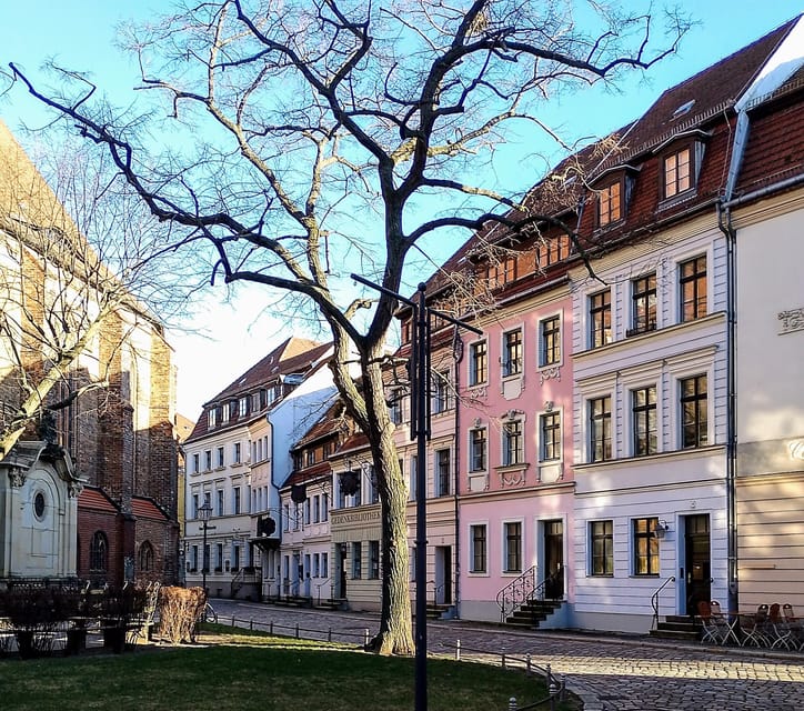 Berlin: From East to West & Wall Tour by Bike with a Guide - Berlin Palace and Museum Island, a quick lesson in how modern Berlin rebrands