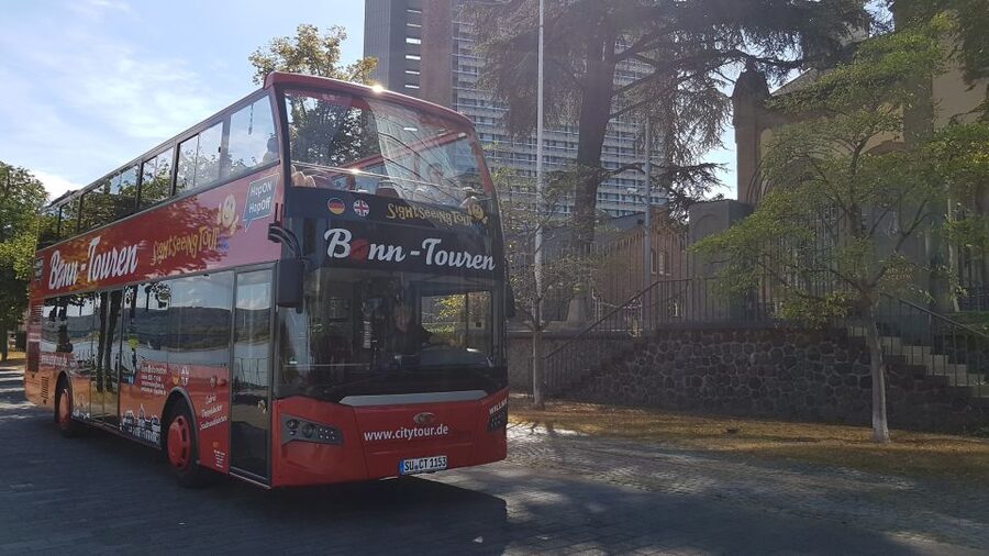 Bonn: 24-Hour Hop-On Hop-Off Sightseeing Bus Ticket - Audio guide and headphones: listen like a local, not like a passenger