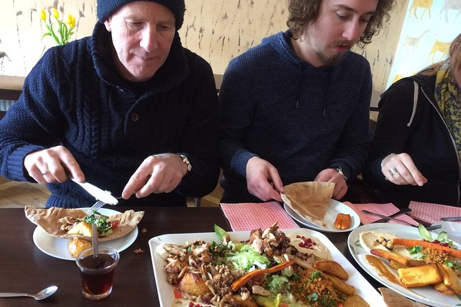 Classic Bites and Culinary Trends Neighborhood Food Tour in Berlin - Fusion savory stop plus the Berlin street beer ritual at street level