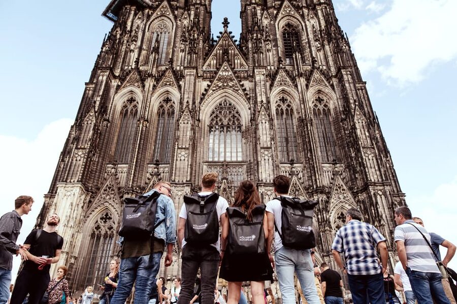 Cologne: Brewery Tour with 3 Kölsch Beer Tastings - Heumarkt: where the walk lands and the vibe shifts