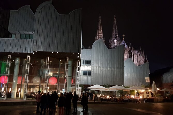 Cologne night tour "Torch tour alternative night watchman" - Stop 2: Historic Old Town, From Colonia to Kölle After Dark