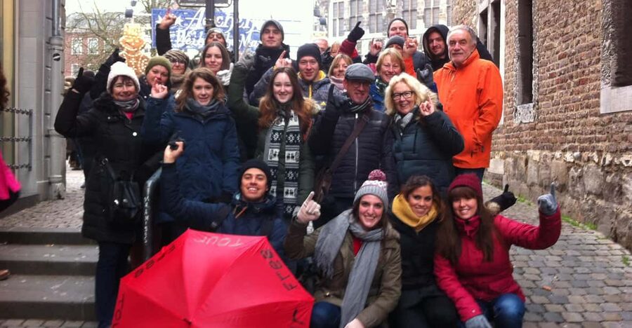 Explore Aachen with Passionate Tour Guides - Meeting Point at Markt 41: Starbucks and a Red Umbrella