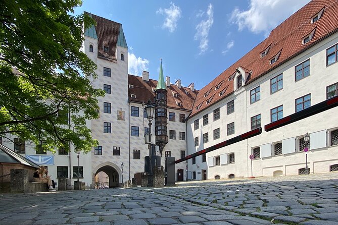 Fall in Love with Munich in a Private Old Town Walking Tour - Frauenkirche and Marienplatz: devil prints, cathedral wind, and the Glockenspiel show