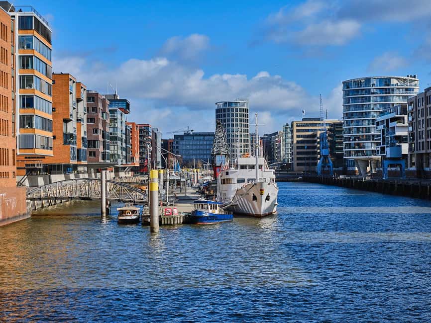 Guided tour of Hamburg's Speicherstadt - warehouse, free port & duty-free - Sandtorhafen and the industrial 19th-century shift in how goods moved