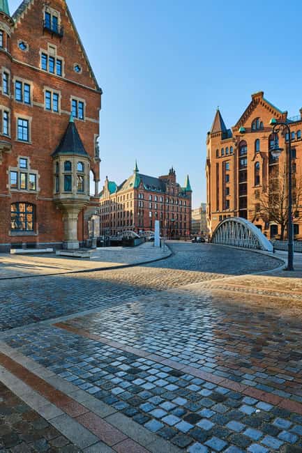 Guided tour of Hamburg's Speicherstadt - warehouse, free port & duty-free - Speicherstadt as red brick work life: jobs you can picture