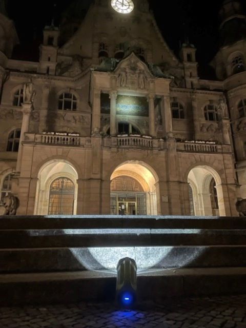 Hanover: Flashlight Guided Walking Tour at Night - Leineschloss After Dark: Neoclassical Architecture and River Views