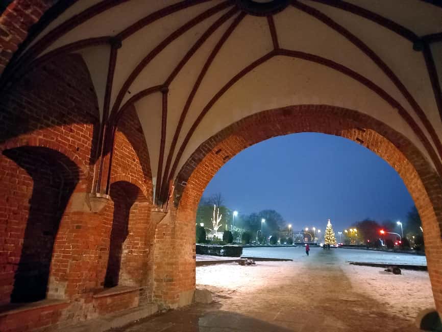 Historic Christmas tour of Lübeck - Starting Under Holsten Gate: Your Advent Walk Through Lübeck