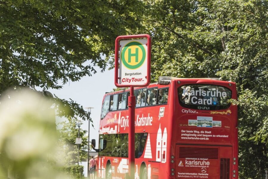 Karlsruhe: 24-Hour Hop-On Hop-Off Sightseeing Bus Ticket - The storytelling you get: German live guide plus 10-language audio