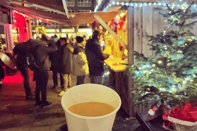 Original Munich Christmas Market Tour with Festive Wine and Food - Theresienwiese, the Oktoberfest grounds: last glühwein and the offbeat bazaar