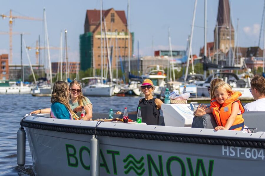 Rostock: Electric Boat Rental on the Warnow River - What you’ll see on the Warnow: cranes, ships, and a better skyline angle